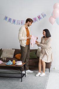 side-view-couple-gender-reveal-party